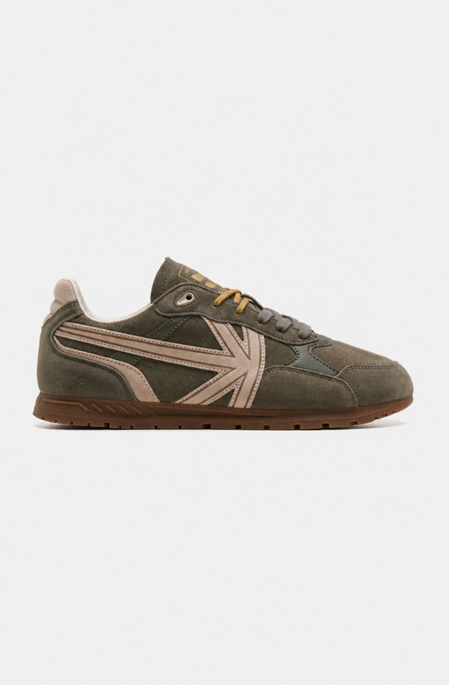Zapatillas Seattle Dk Green en verde oscuro con paneles efecto ante, detalles beige, cordones en contraste y suela de goma marrón.