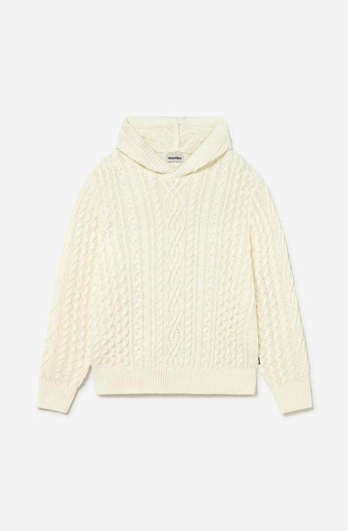 Sudadera unisex de punto trenzado color marfil con capucha y fit relajado de inspiración après ski.