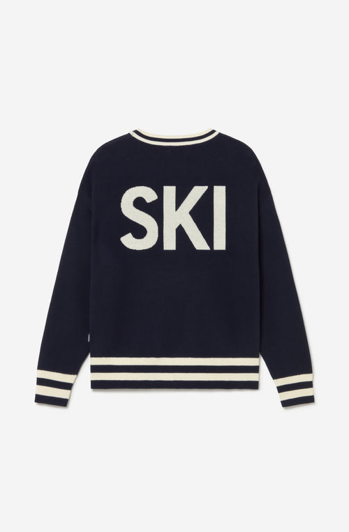 Jersey unisex azul marino de punto con gráfico APRÈS en el frontal, SKI en la espalda y detalles de canalé a contraste.