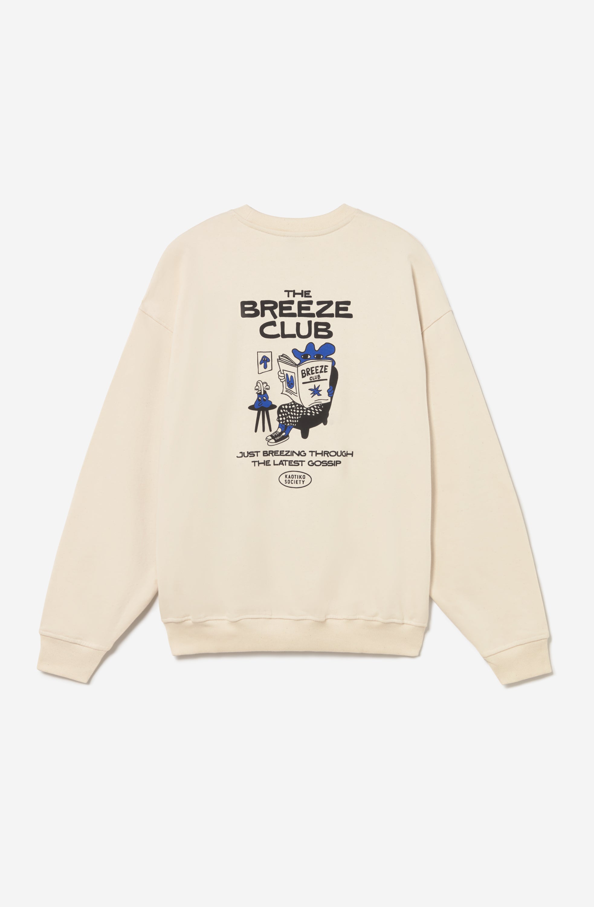 Sudadera unisex oversize color ivory con gráfico Kaotiko Society en el pecho y estampado Just Breezing en la espalda.